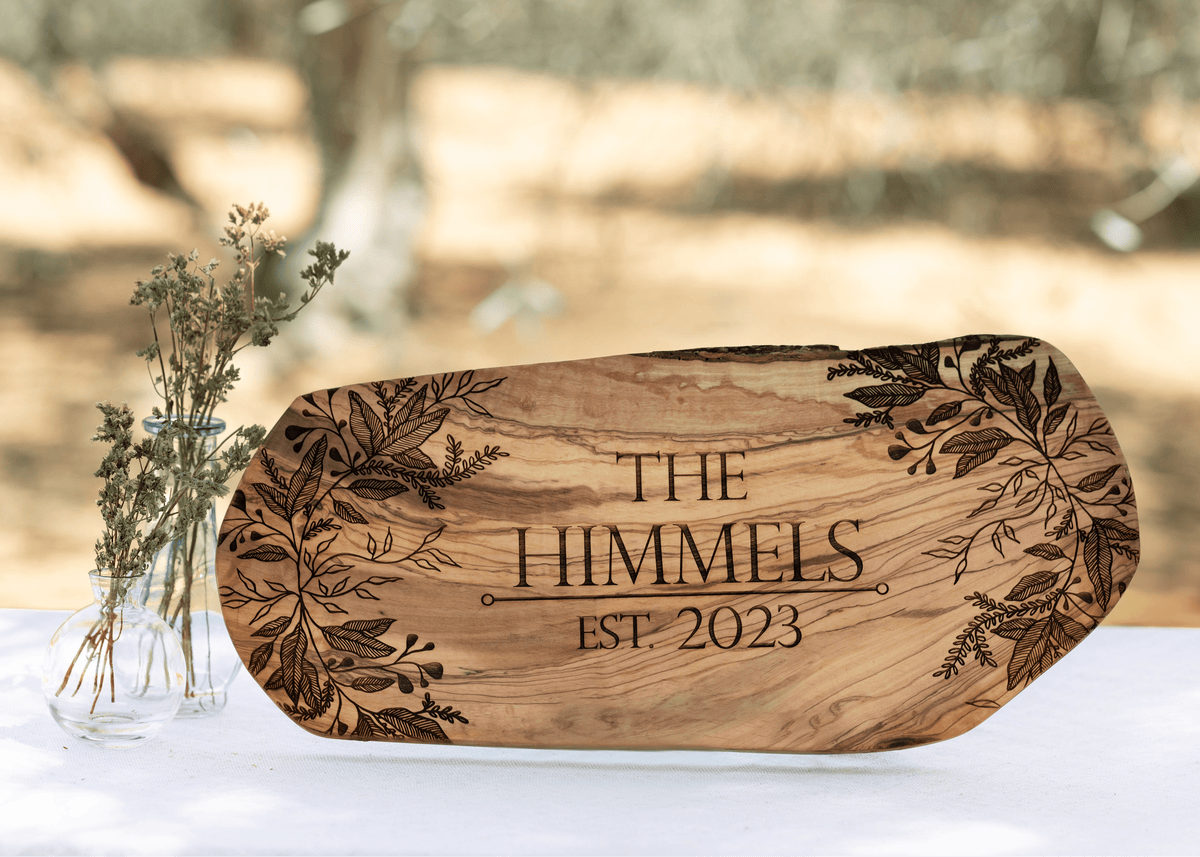 Large olive wood board with botanical design and engraved name for a wedding gift